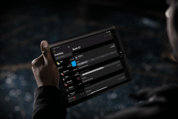 Live event technician using Wireless Workbench Mobile on iPad to monitor Shure wireless system inventory and RF settings